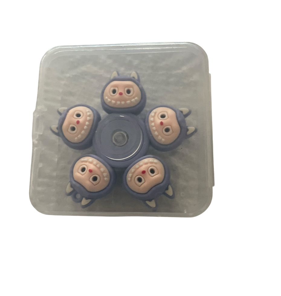 Monster-Themed face-changing spinner