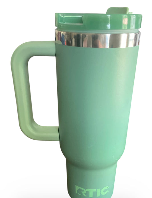 RTIC Road Trip tumbler in a light green color