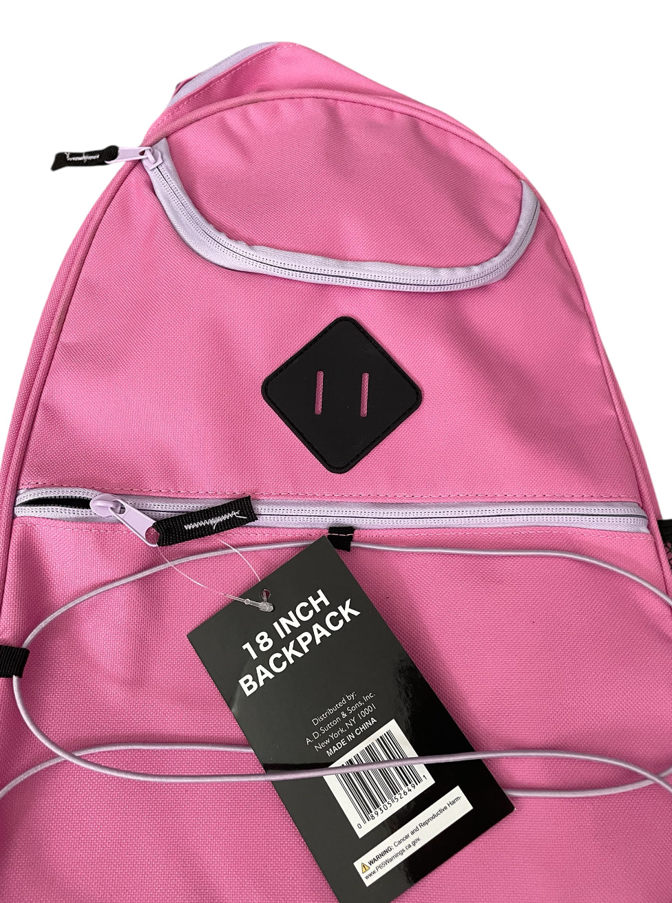 Pink 18-inch backpack with bungee cords and mesh side pockets.