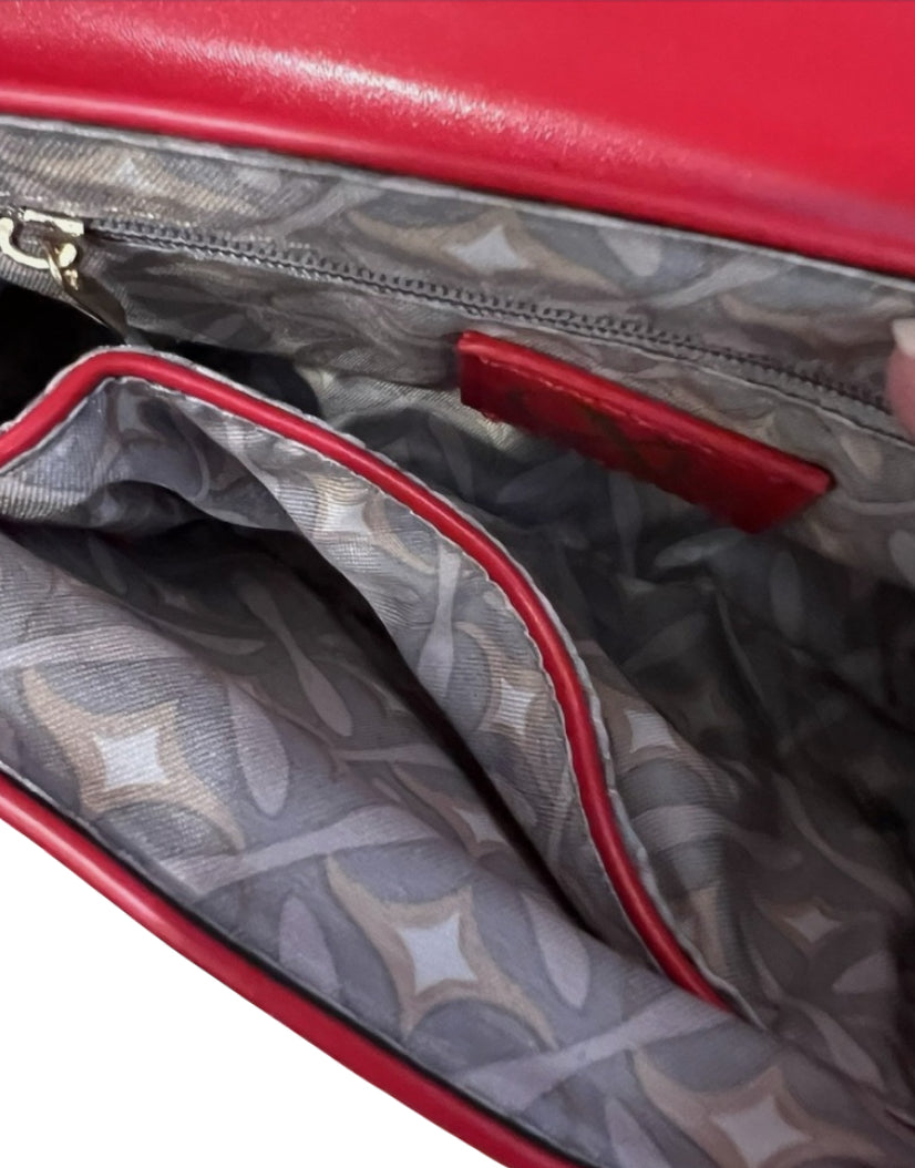 CXL by Christian Lacroix Laine Matte Patent Crossbody Bag in red.