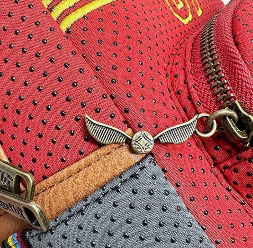 Loungefly Harry Potter Gryffindor Quidditch Uniform Mini Backpack. 
