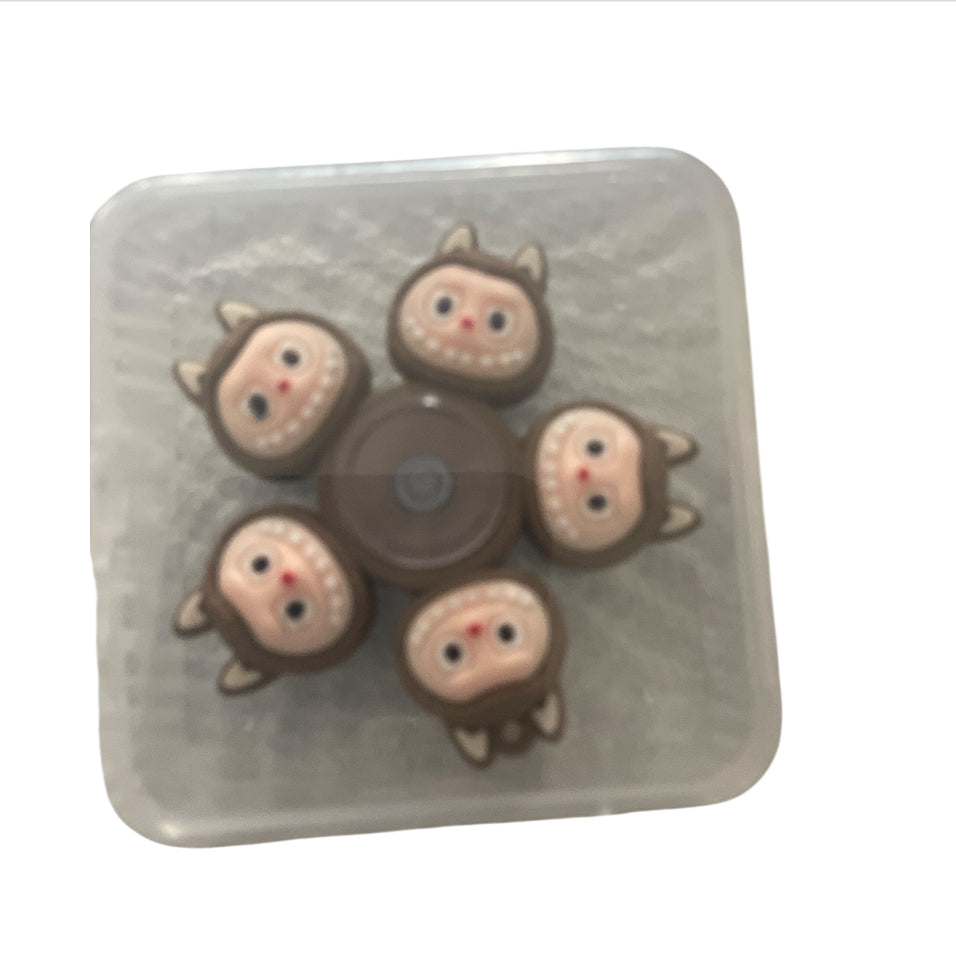 Monster-Themed face-changing spinner