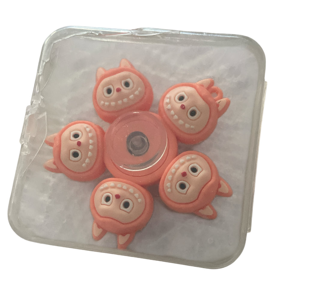 Monster-Themed face-changing spinner