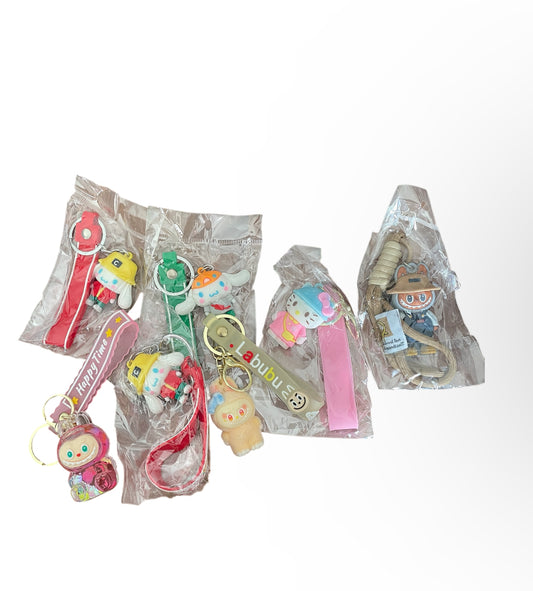 Monster + Hello Kitty keychain Collection in various Outfits.