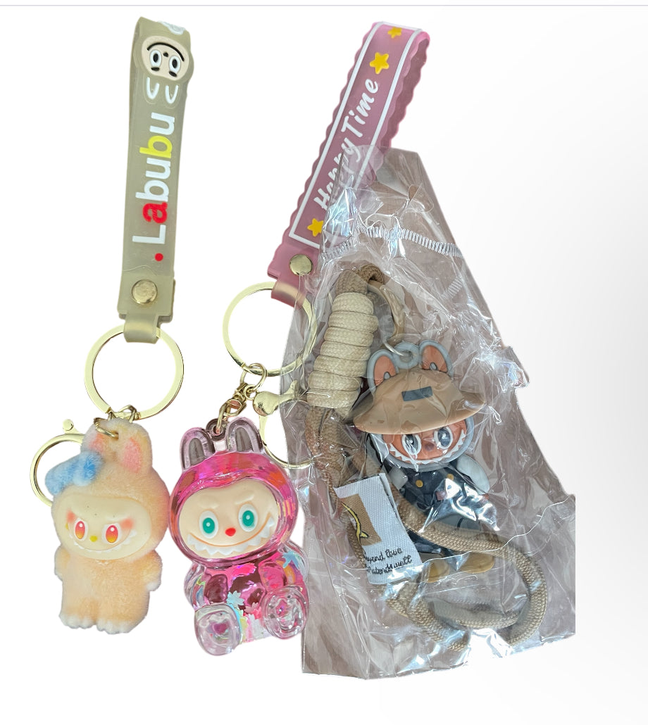 Monster + Hello Kitty keychain Collection in various Outfits.