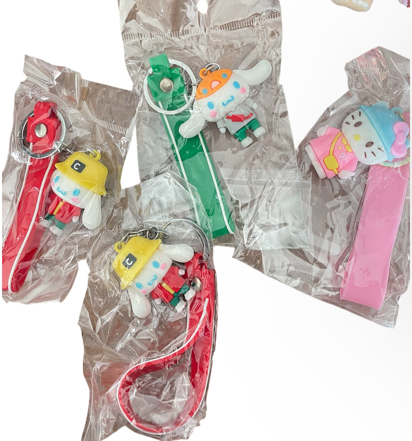 Monster + Hello Kitty keychain Collection in various Outfits.