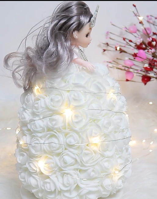 Doll with White Roses and Lights