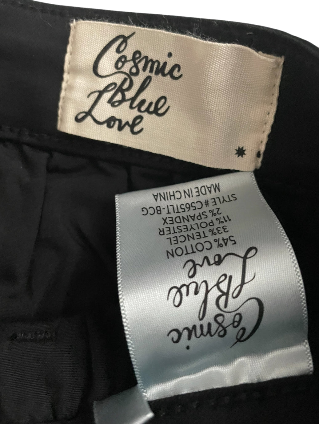 Cosmic Blue Love black skinny-fit trousers featuring thin pink piping (27)